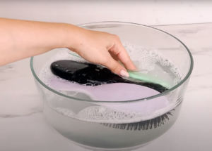 Clean the oil from the bristles with shampoo
